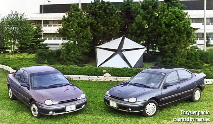 Chrome pentastar and two Neons outside their factory